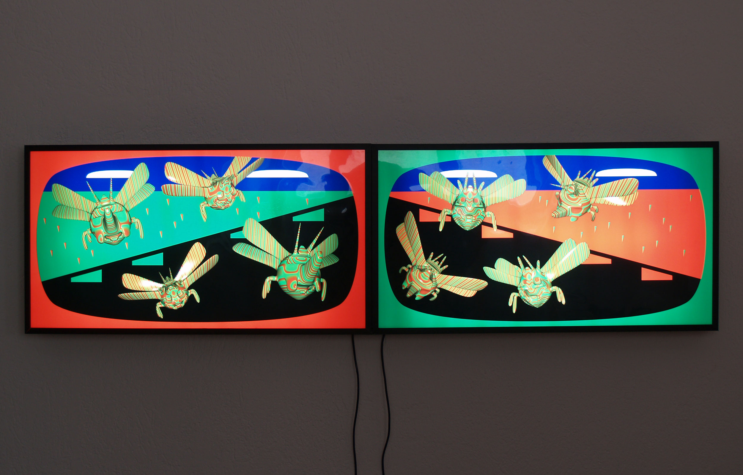 Two wall-mounted screens showing striped flying insects against red, green and black fields