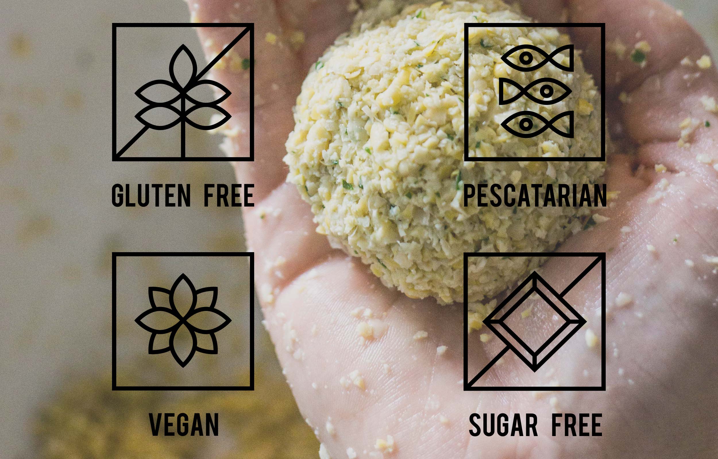 Gluten-free, pescatarian, vegan and sugar-free icons over a breaded food bite