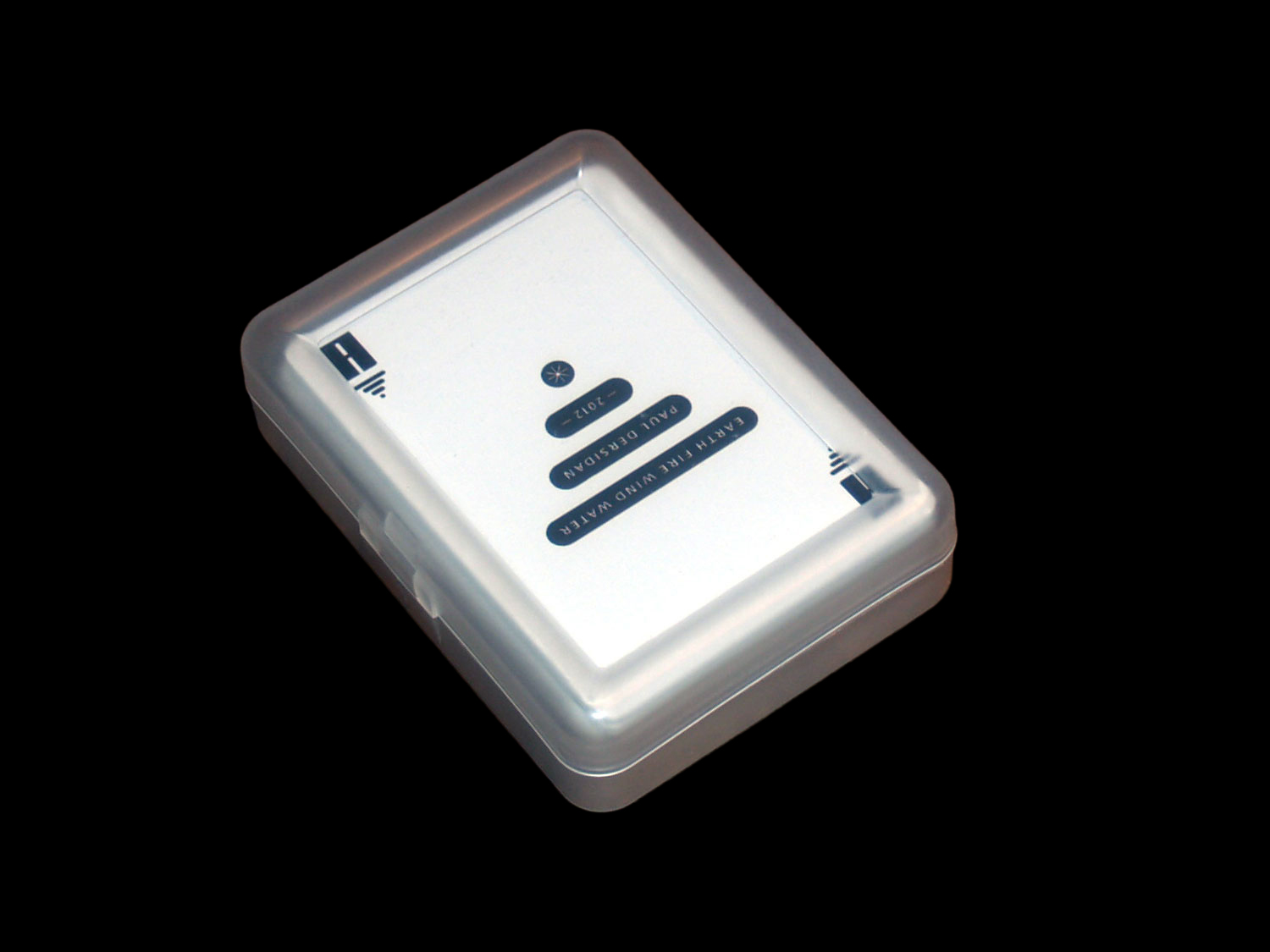 Clear plastic case holding a black-and-white geometric playing-card deck