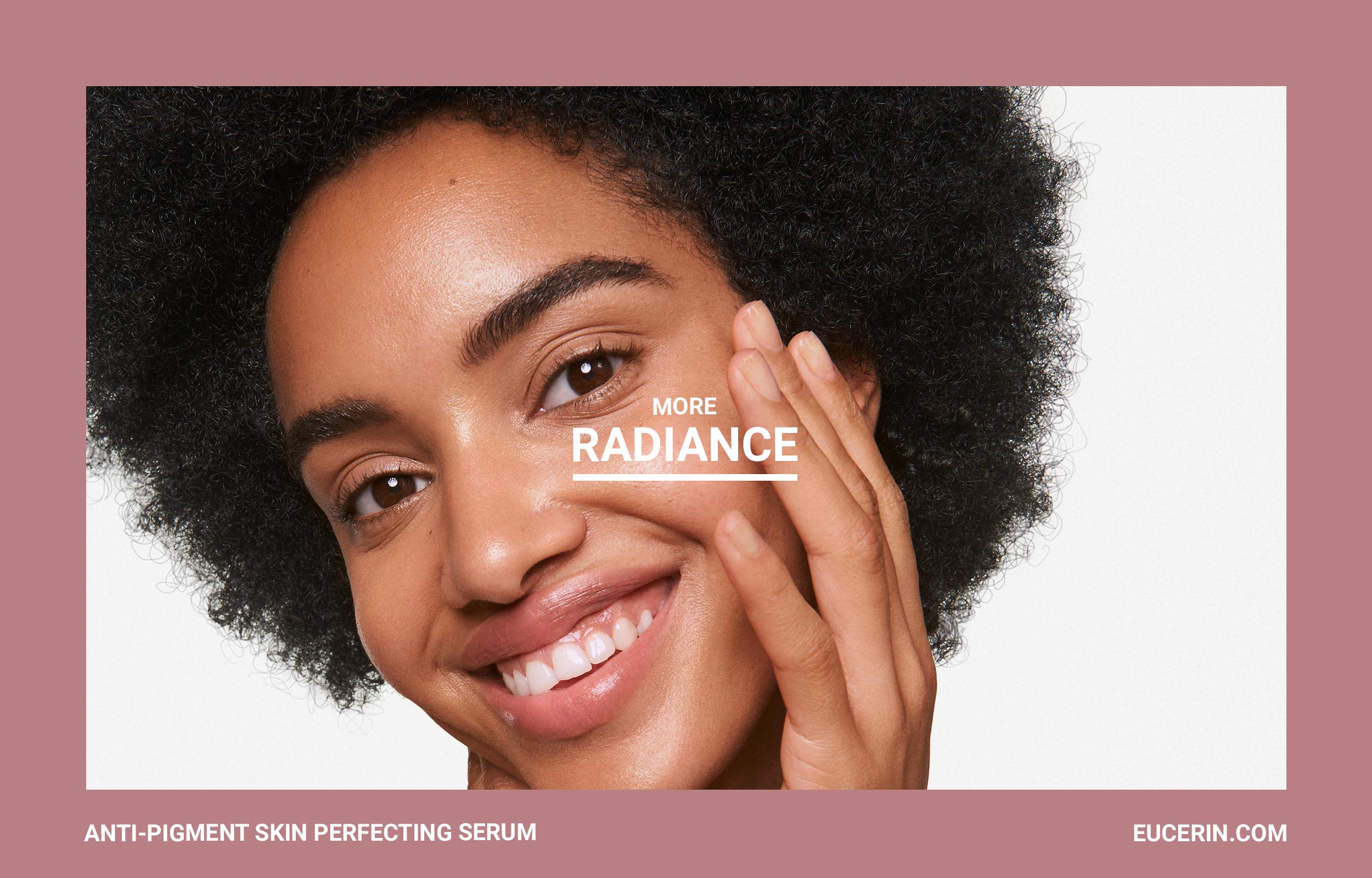 Close-up of a smiling woman in a muted pink Eucerin Radiance campaign frame