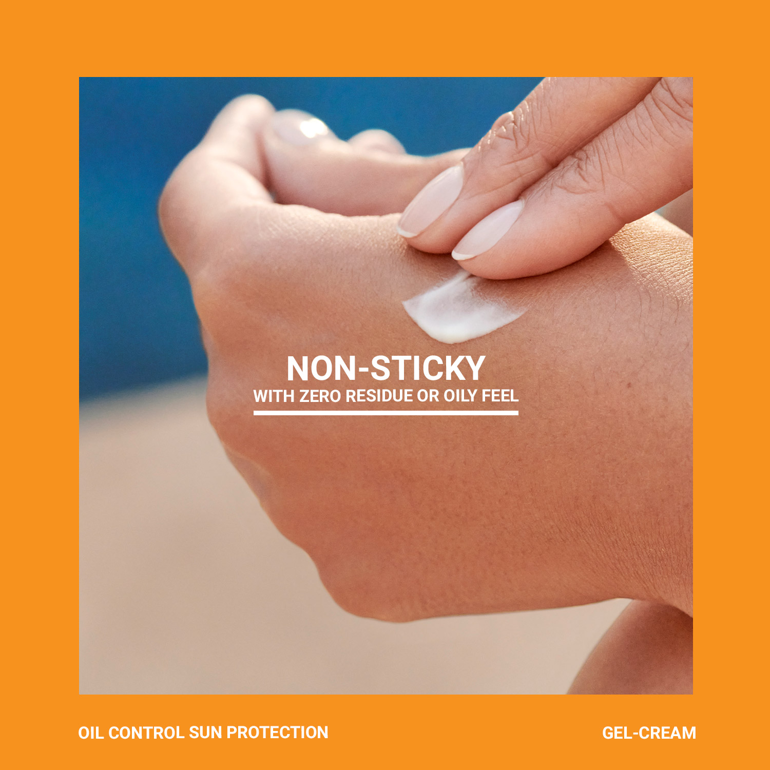 Close-up of a fingertip spreading white sunscreen onto the back of a hand