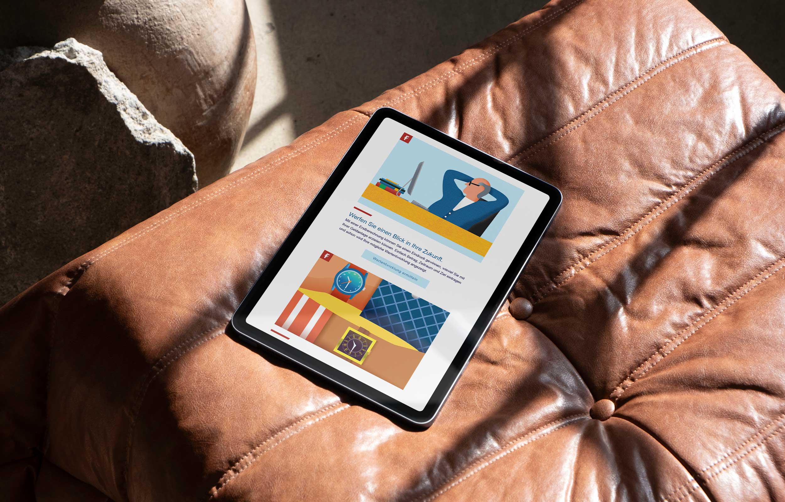 Tablet displaying a Fidelity webpage on a brown leather cushion