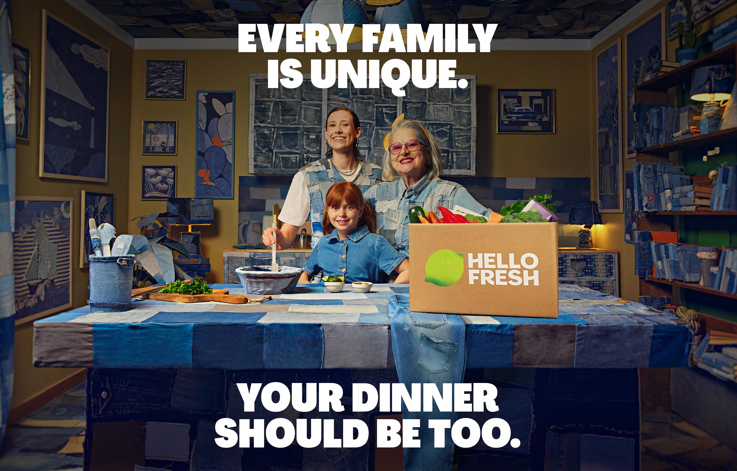 Family seated at a dining table with a HelloFresh box and campaign headline text