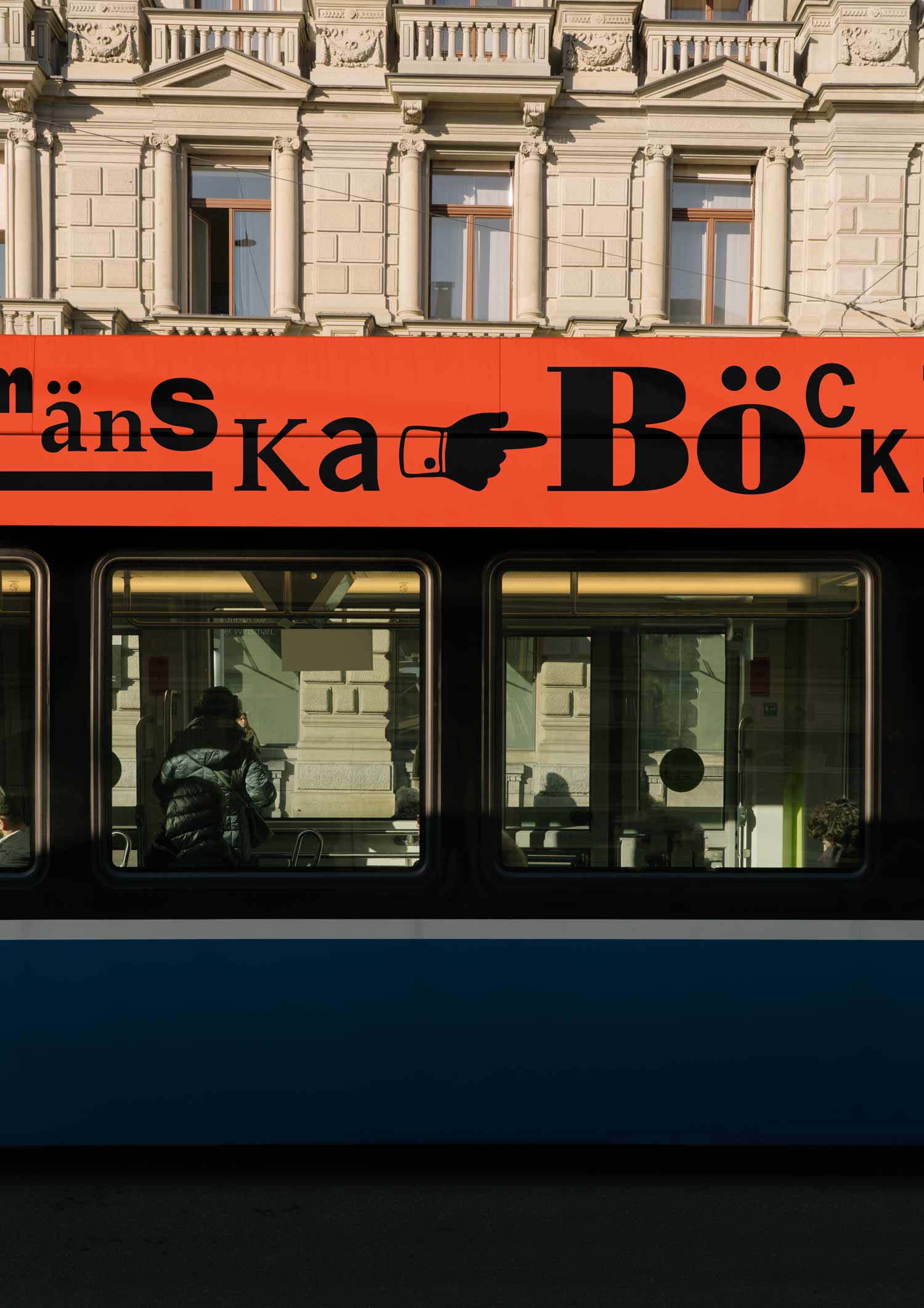 Orange Rumänien book fair tram wrap in front of a historic building