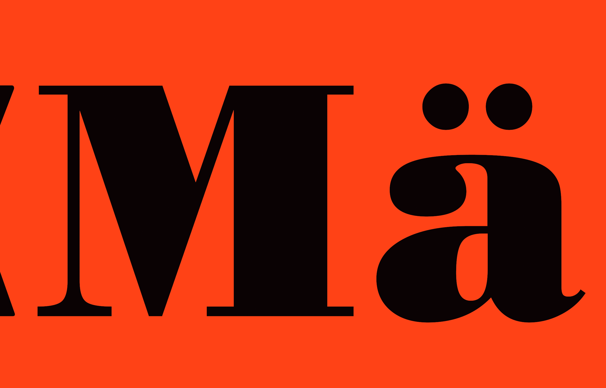 Oversized black Mä lettering on a bright orange field