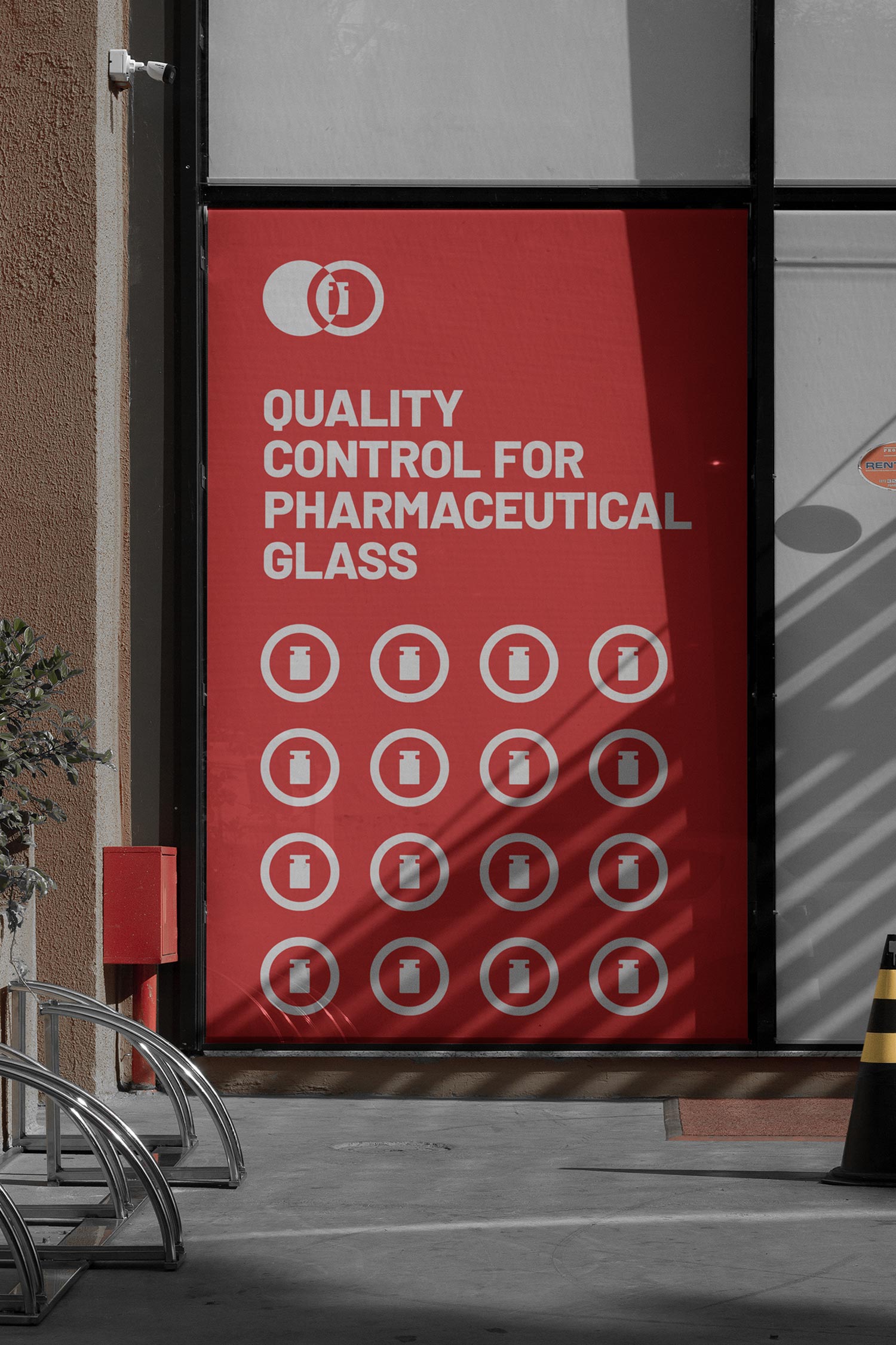 Tall red Isotronic Quality Control for Pharmaceutical Glass sign with circular icons