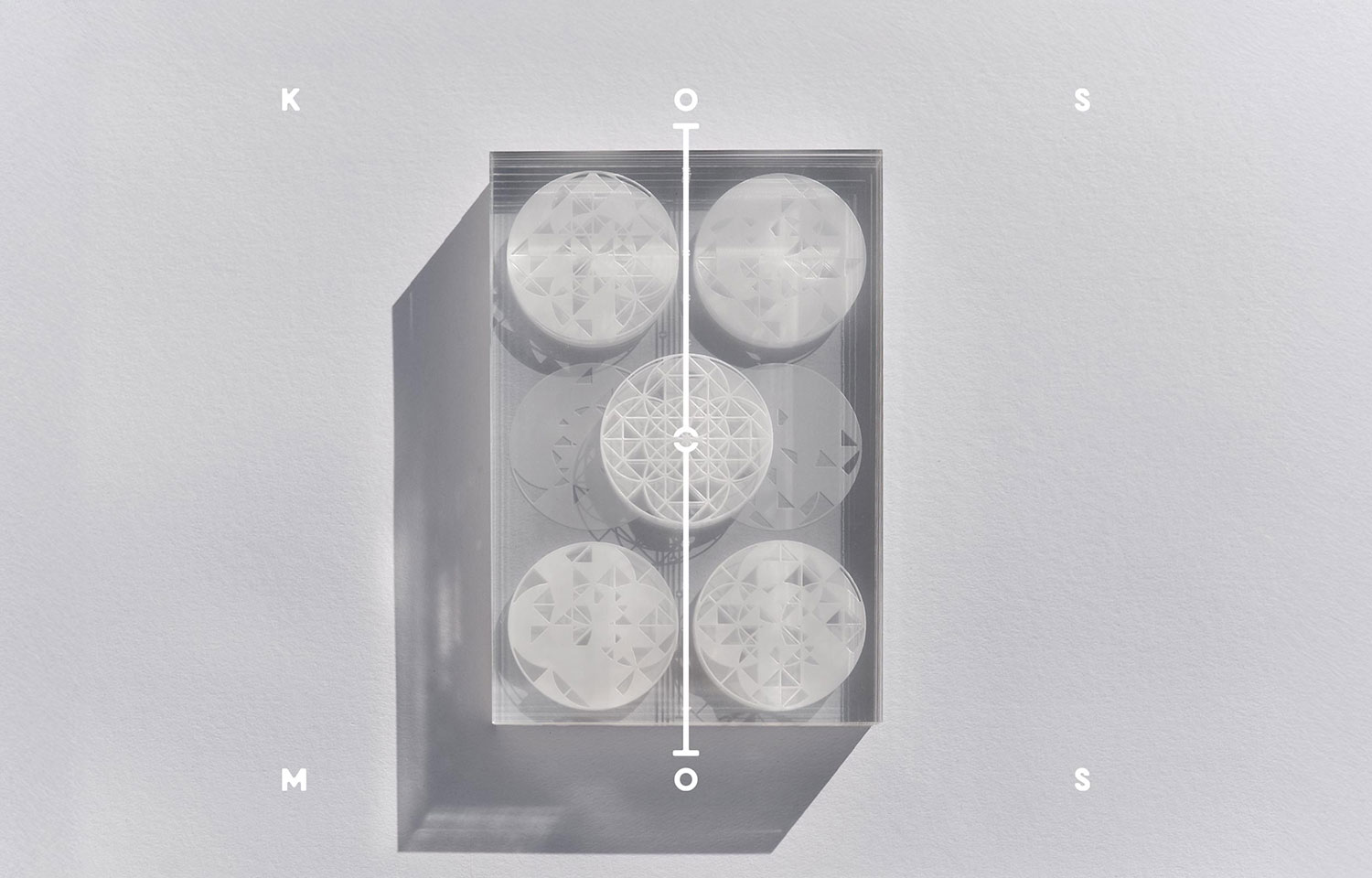 White model with a circular clock face inside a clear box