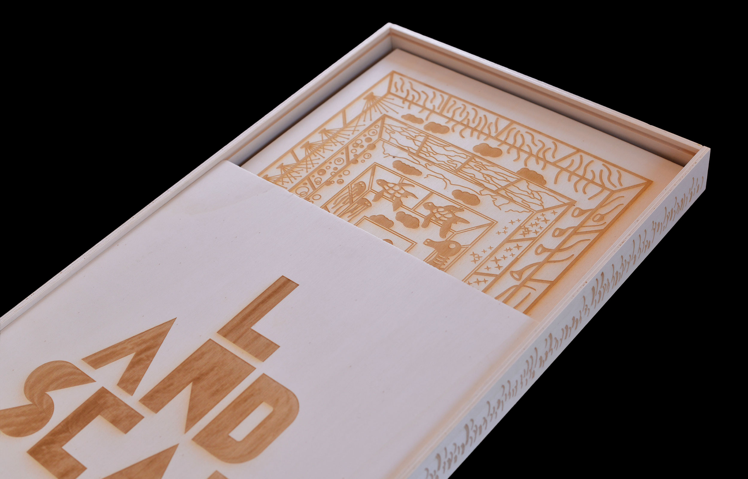 Open white presentation box holding gold-printed Landscape cards