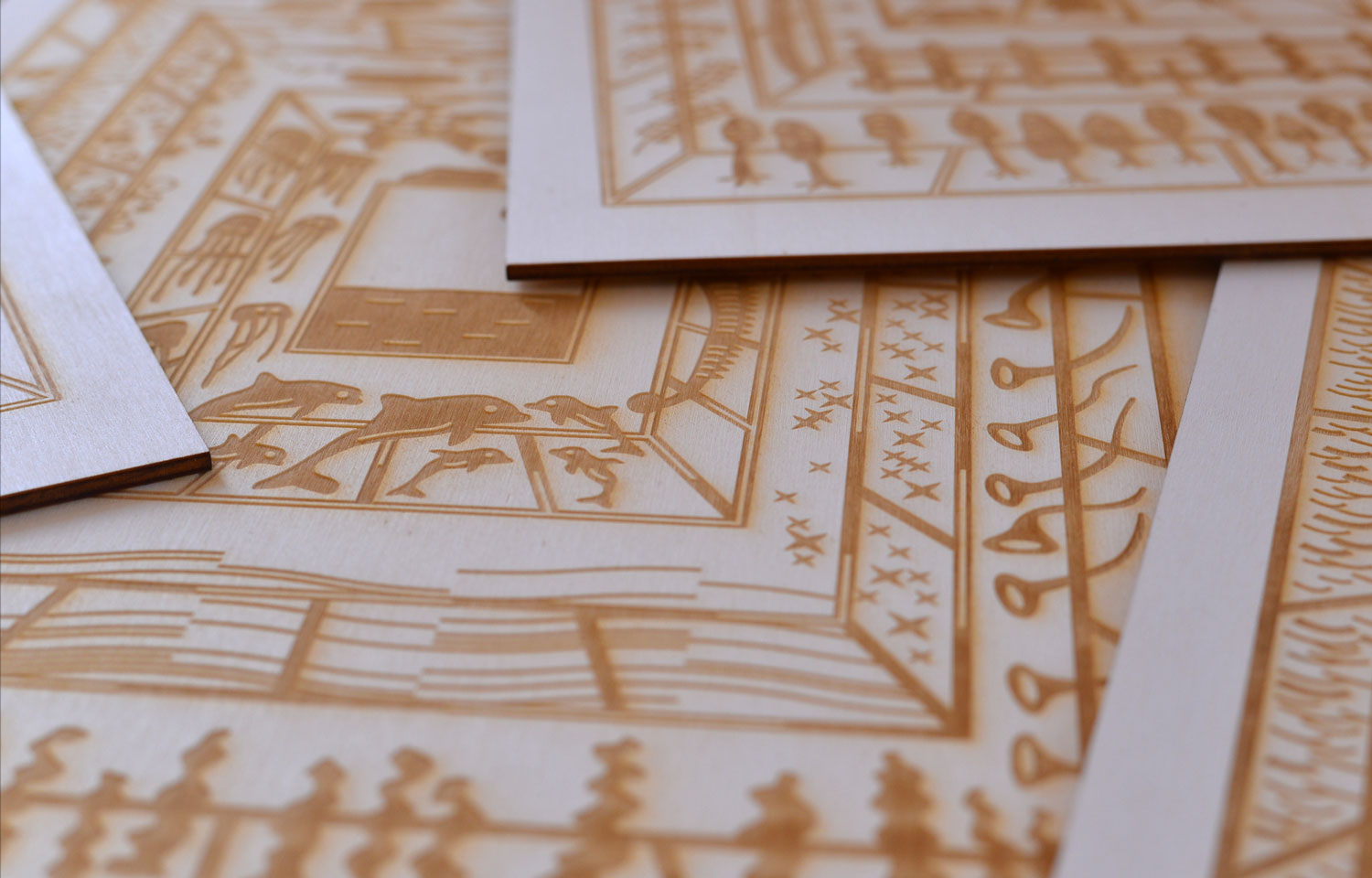 Stacked white cards with gold geometric border illustrations
