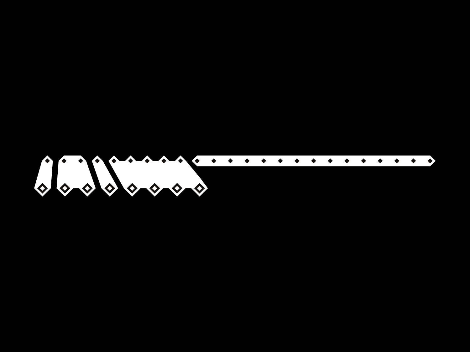 Long white geometric bar with black diamond motifs on black