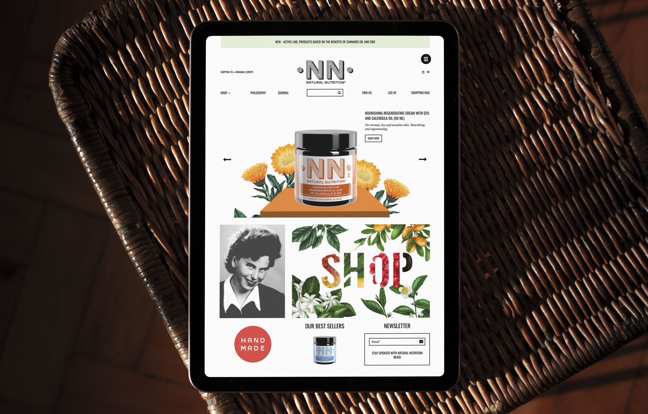 Tablet displaying an NN Natural Nutrition shopping webpage in a wicker chair