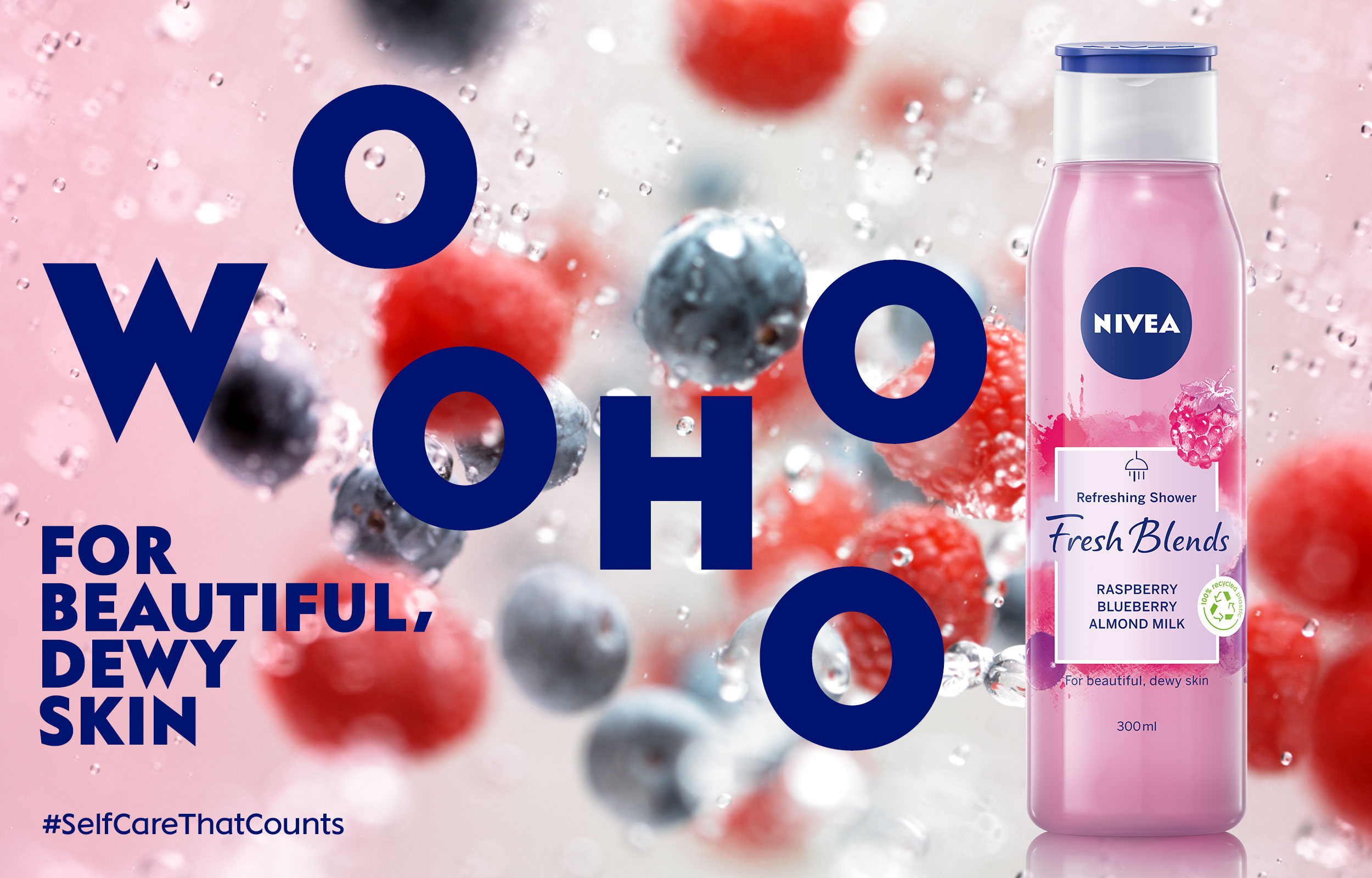 Nivea Fresh Blends pink bottle with berries behind large blue letterforms