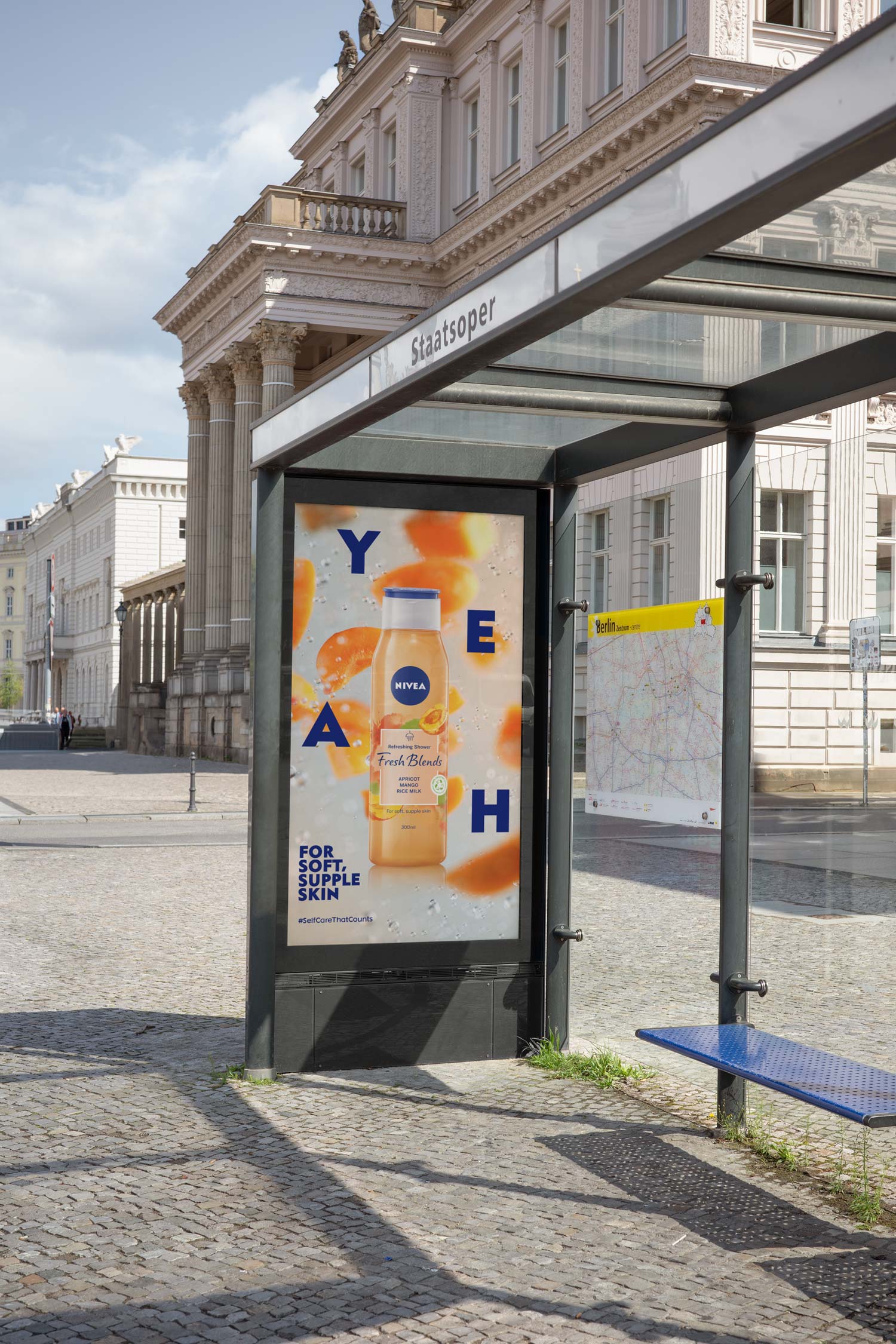 Nivea citrus campaign poster displayed in a street advertising case