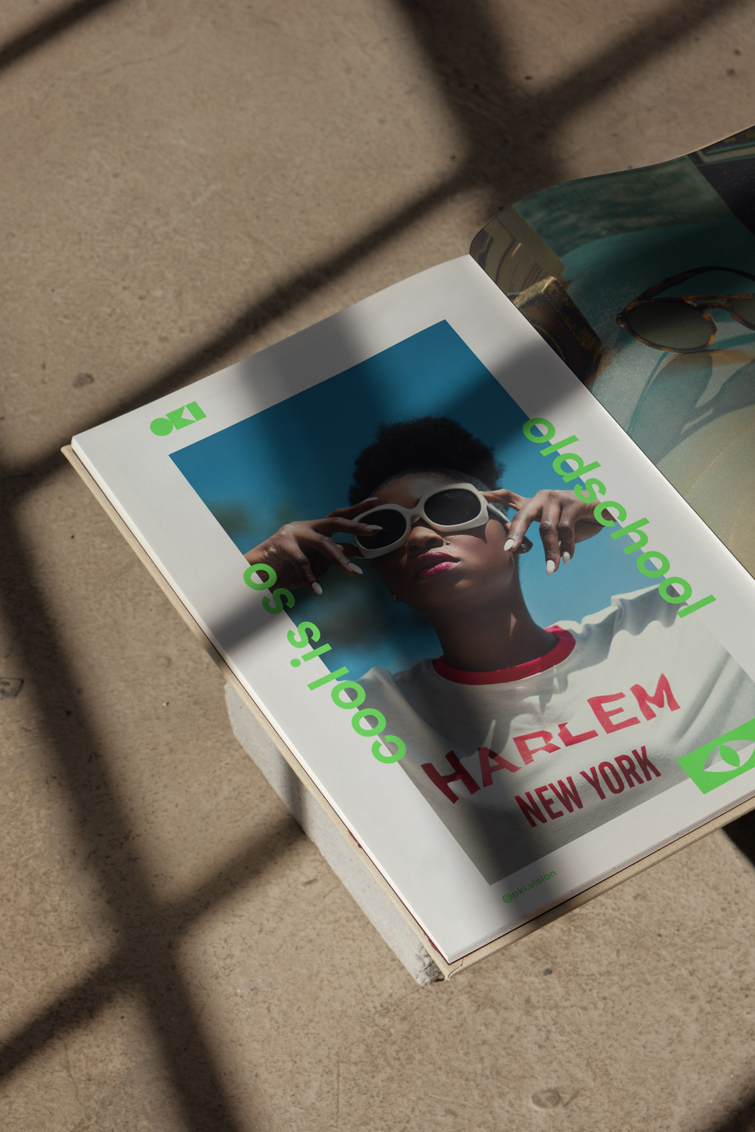 Stack of Oki Harlem New York printed cards with a sunglass-wearing portrait
