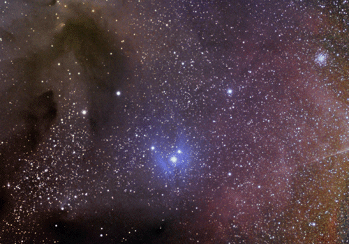 Colourful star field and nebula against black