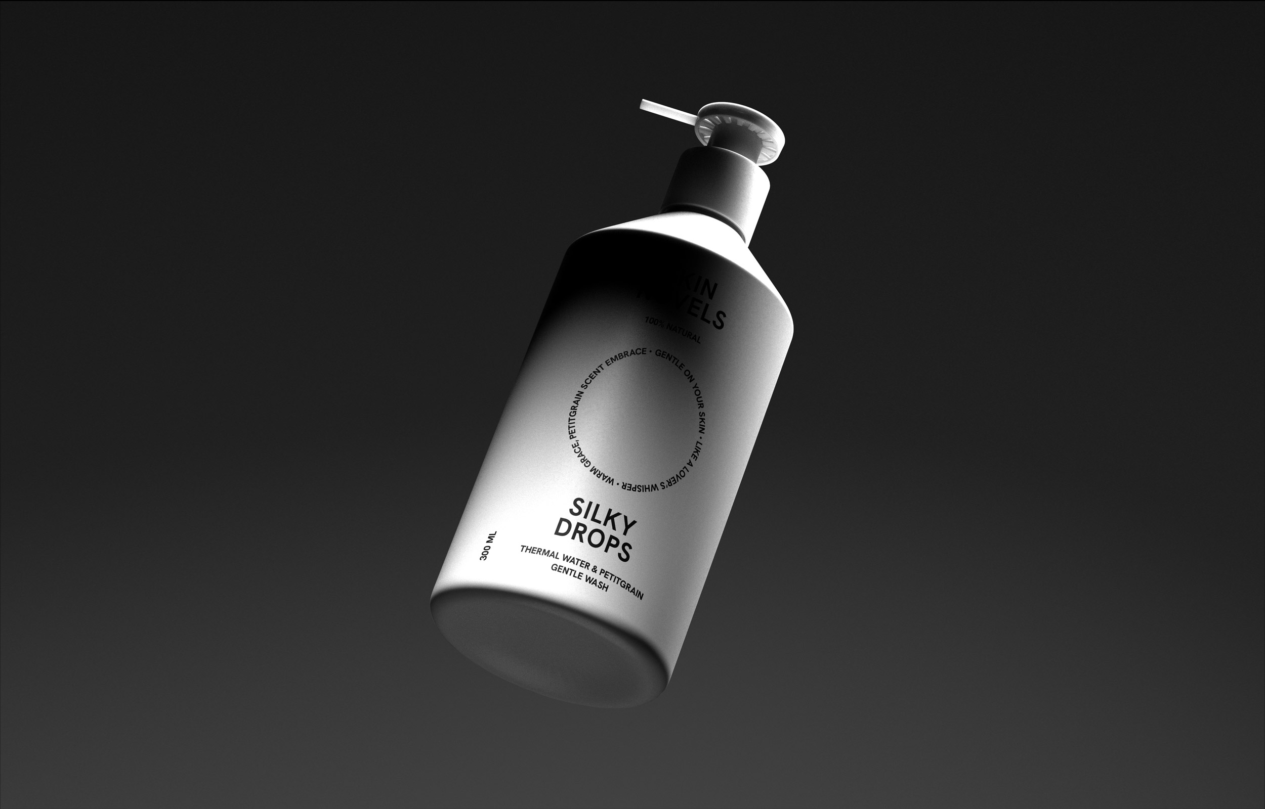 Grey Skin Novels Silky Drops pump bottle floating against a dark background