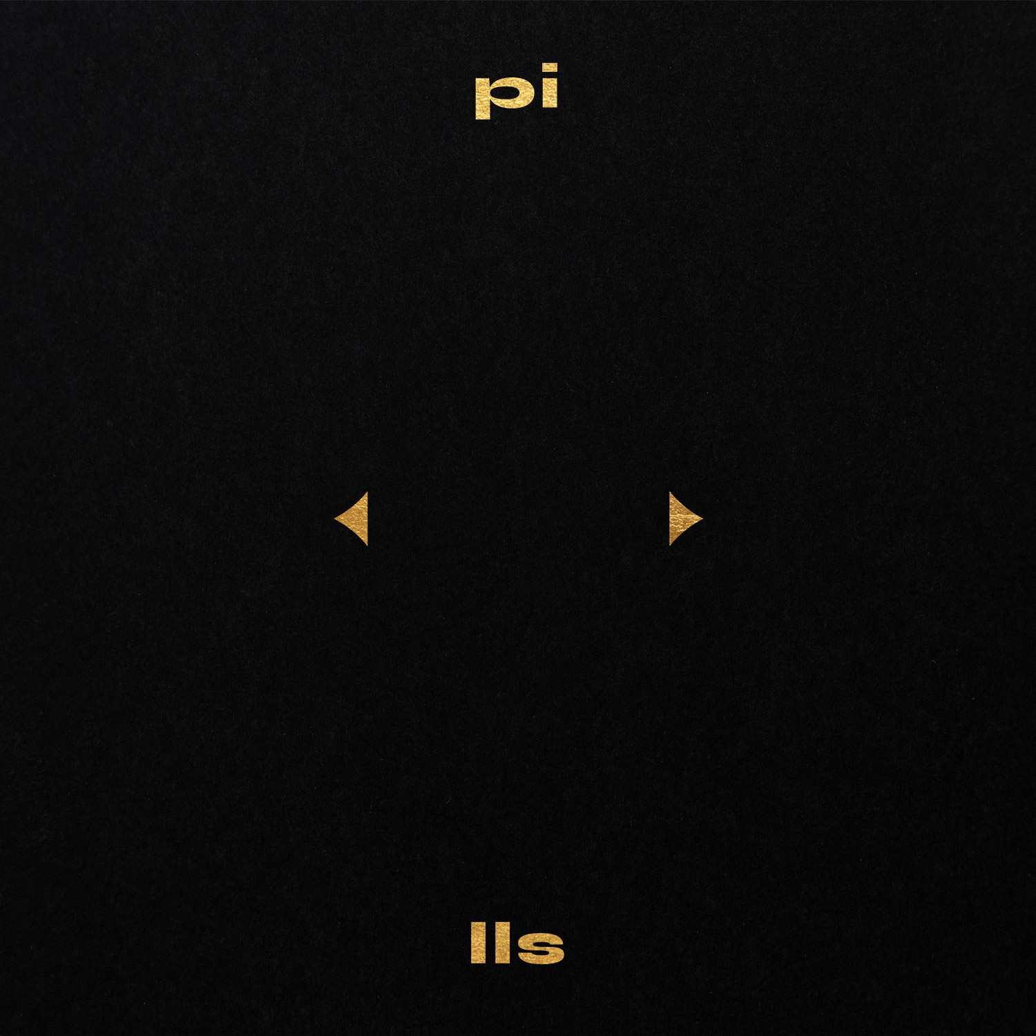 Two small gold triangle marks with Pi Lls lettering on black